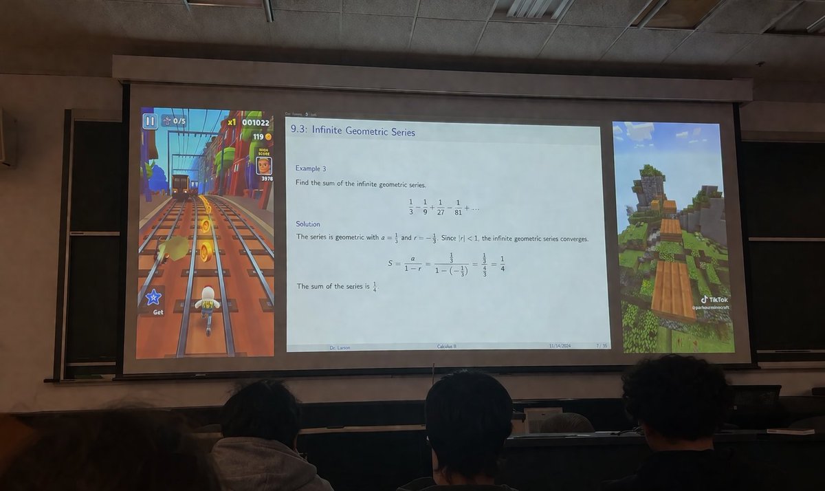Brainrot Lecture Hall Projector Qwen Image prompt example: A photograph of a classroom projector screen displaying a math lecture flanked by two mobile gameplay videos.