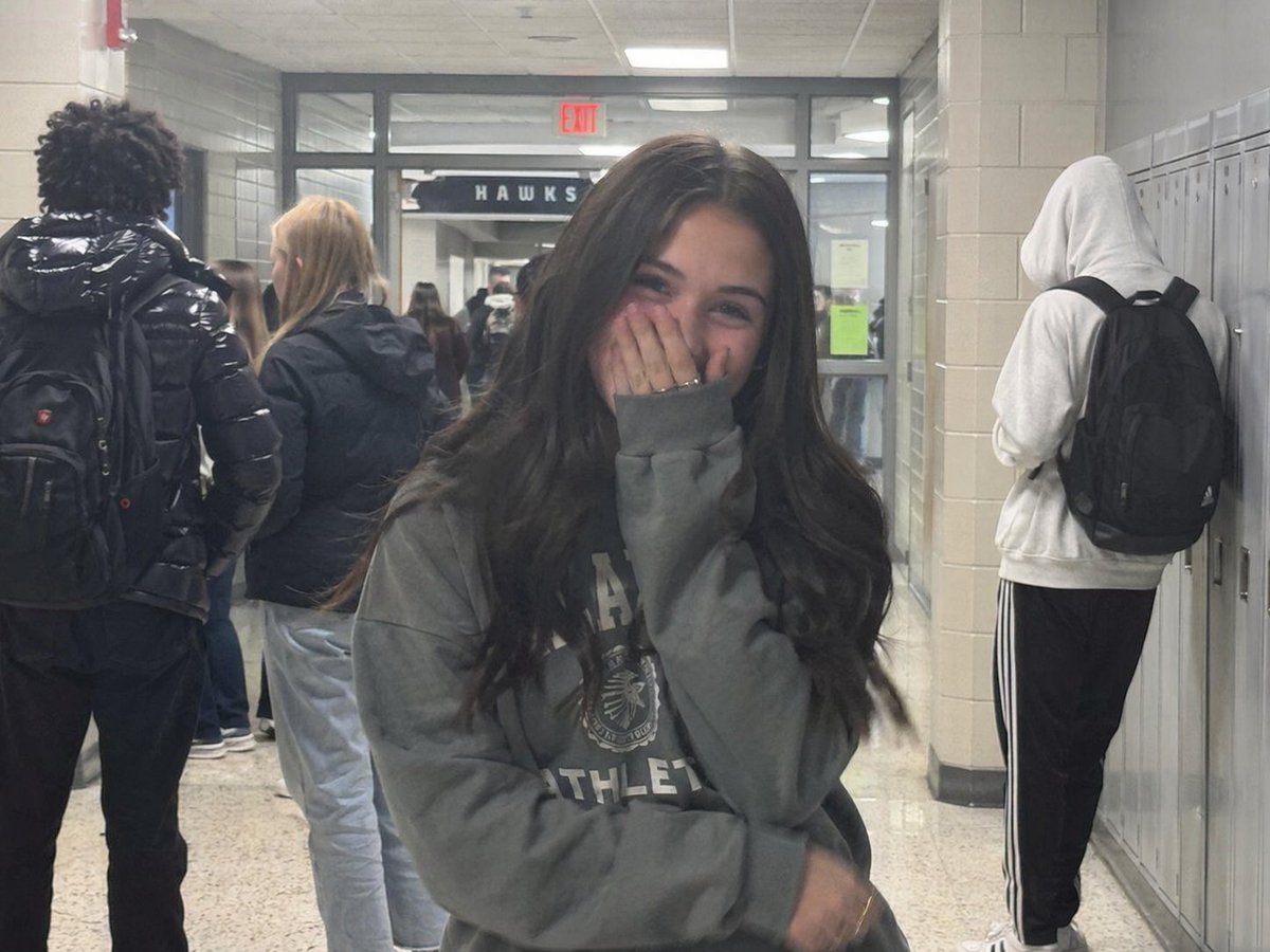 Early 2020s High School Photo GPT Image 2 prompt example: A prompt that mimics the candid aesthetic of a high school photo taken on an iPhone in the early 2020s.