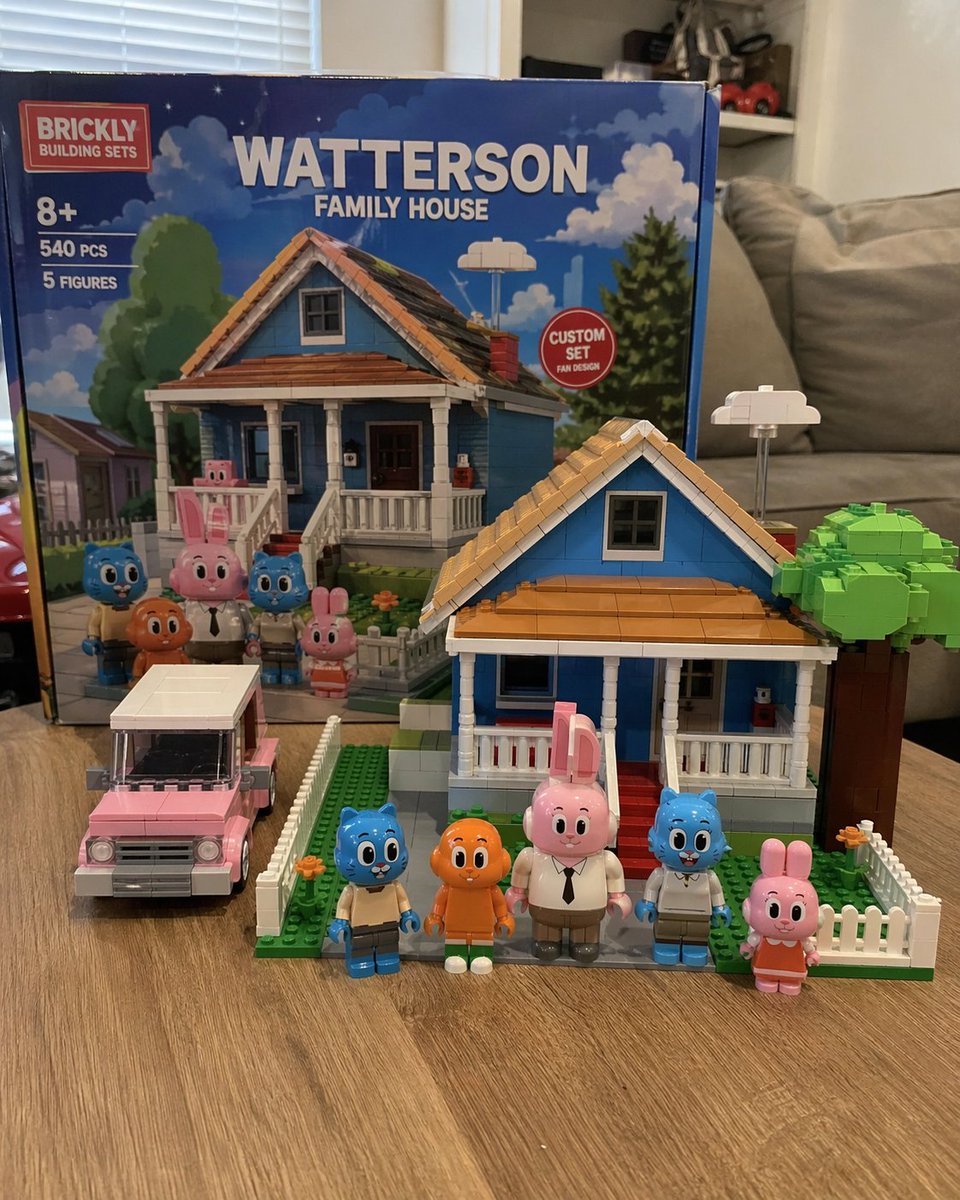 Custom Building Block Set Photography Qwen Image prompt example: Generates a photorealistic image of a custom toy building set with its box, assembled house, vehicle, and...