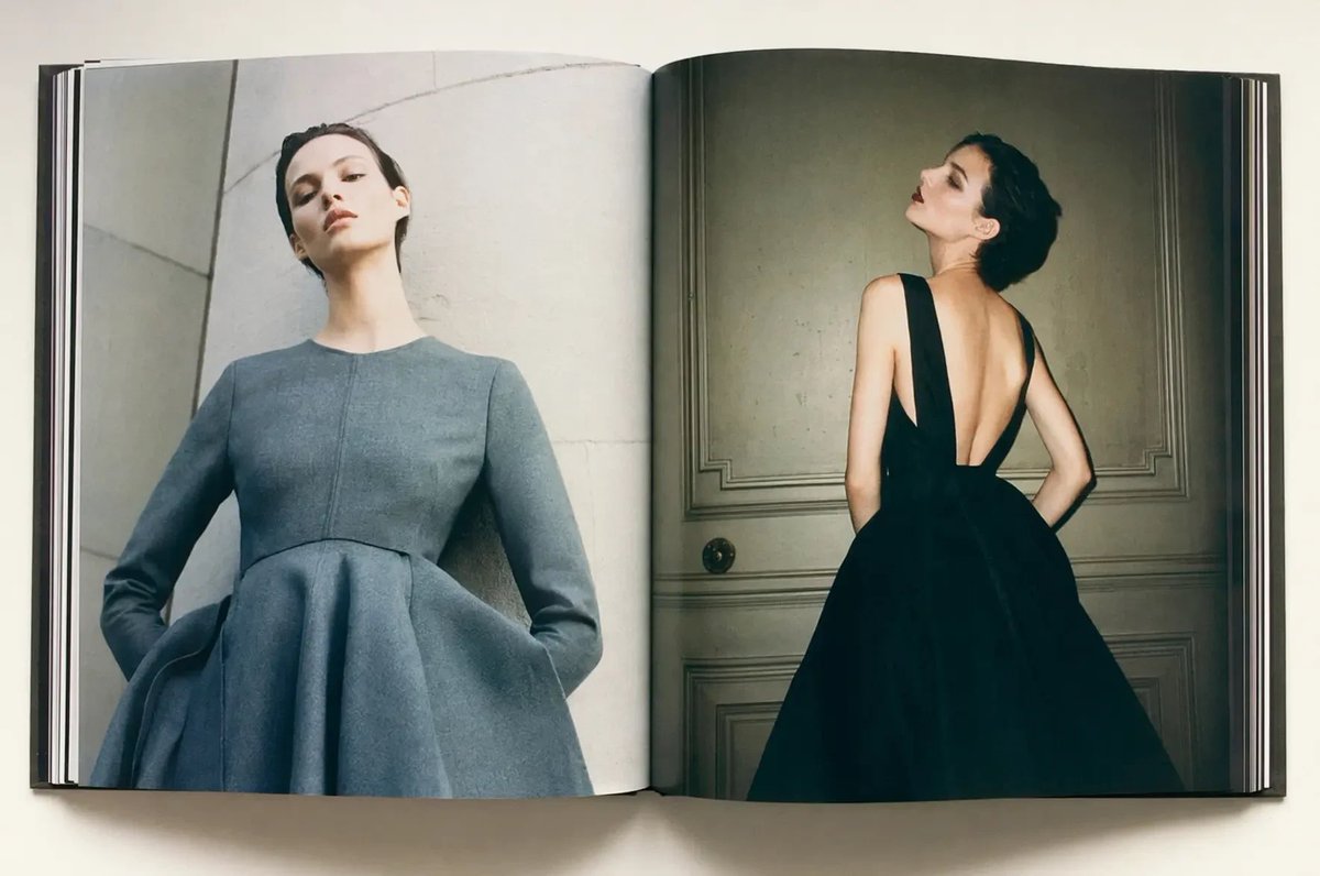 Luxury Fashion Book Spread Qwen Image prompt example: This prompt generates a realistic overhead photo of an open fashion book featuring a two-page couture editorial spread,...