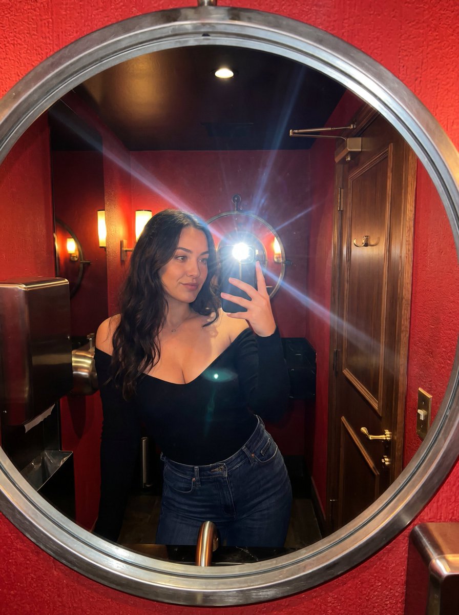 Flash Mirror Selfie in Red Restroom Qwen Image 프롬프트 예시 변형 2: This prompt generates a realistic candid mirror selfie with harsh phone flash in a stylish red restroom, ideal for...