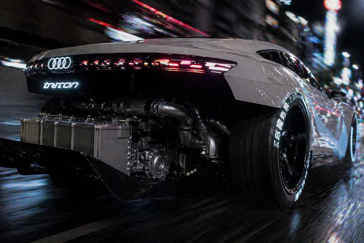Cyberpunk Audi Rear Chase Shot Qwen Image 프롬프트 예시: This prompt generates a dramatic photorealistic image of a futuristic Audi supercar speeding through a neon city at night,...