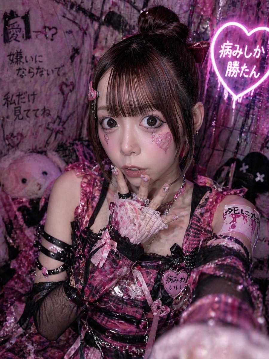 Yami Kawaii Idol Selfie Qwen Image prompt example: This prompt generates a moody pink-and-black idol selfie portrait with yami-kawaii fashion and neon Japanese decor, ideal for...