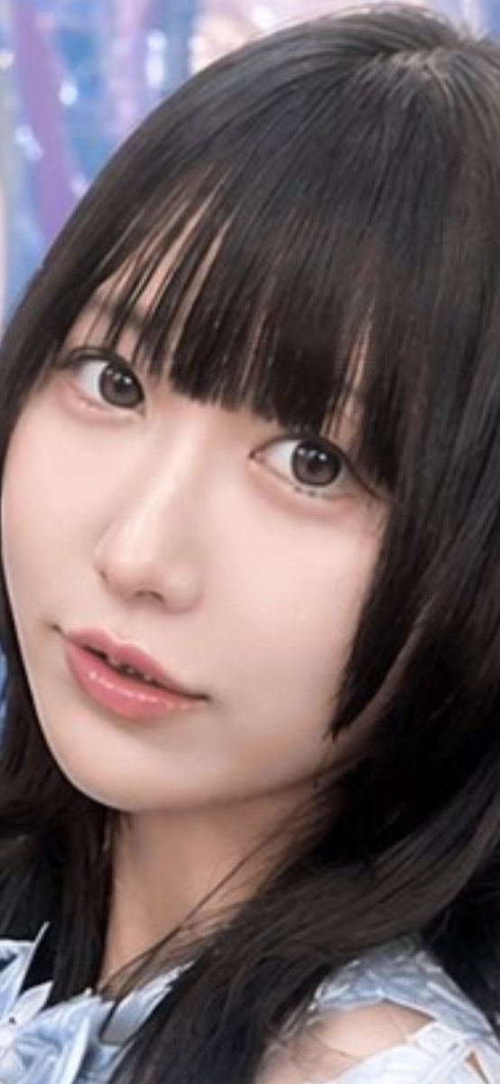 Realistic Japanese Idol Close-Up Qwen Image prompt example: A soft, photorealistic close-up portrait prompt for generating a young Japanese idol-style woman with delicate...