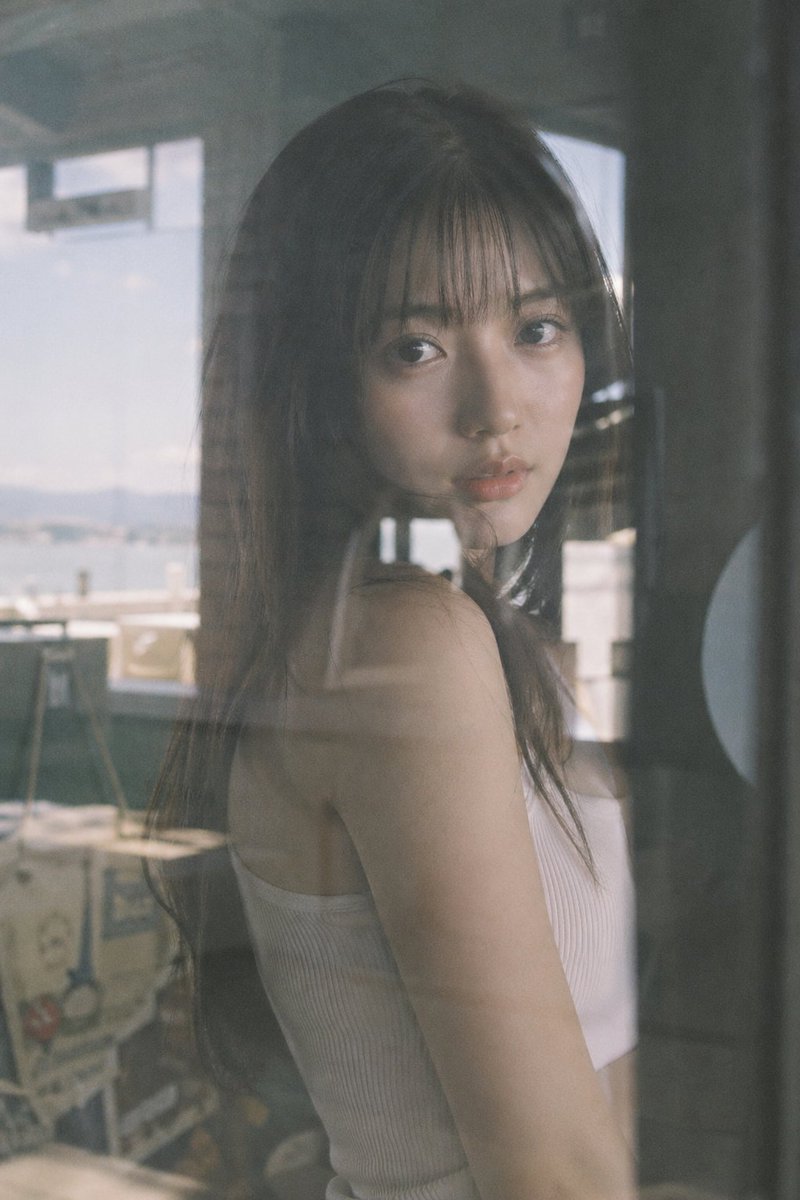 Japanese Idol Reflection Aesthetic GPT Image 2 prompt example: A nostalgic Japanese negative film aesthetic portrait of an idol seen through a mirror or glass reflection with...