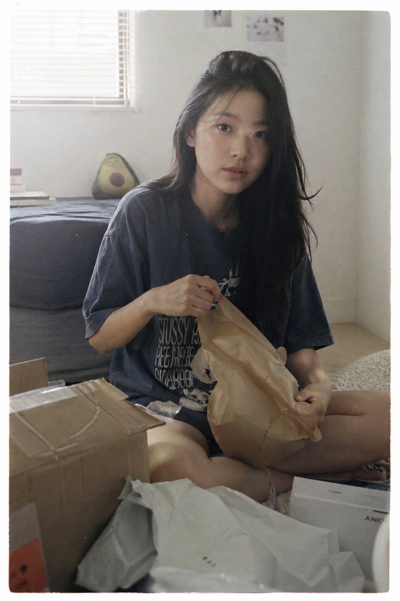 Japanese Film Aesthetic Unboxing Scene 的 GPT Image 2 提示词示例图：A nostalgic and natural Japanese film style prompt depicting a relaxed unboxing moment with soft lighting and muted...
