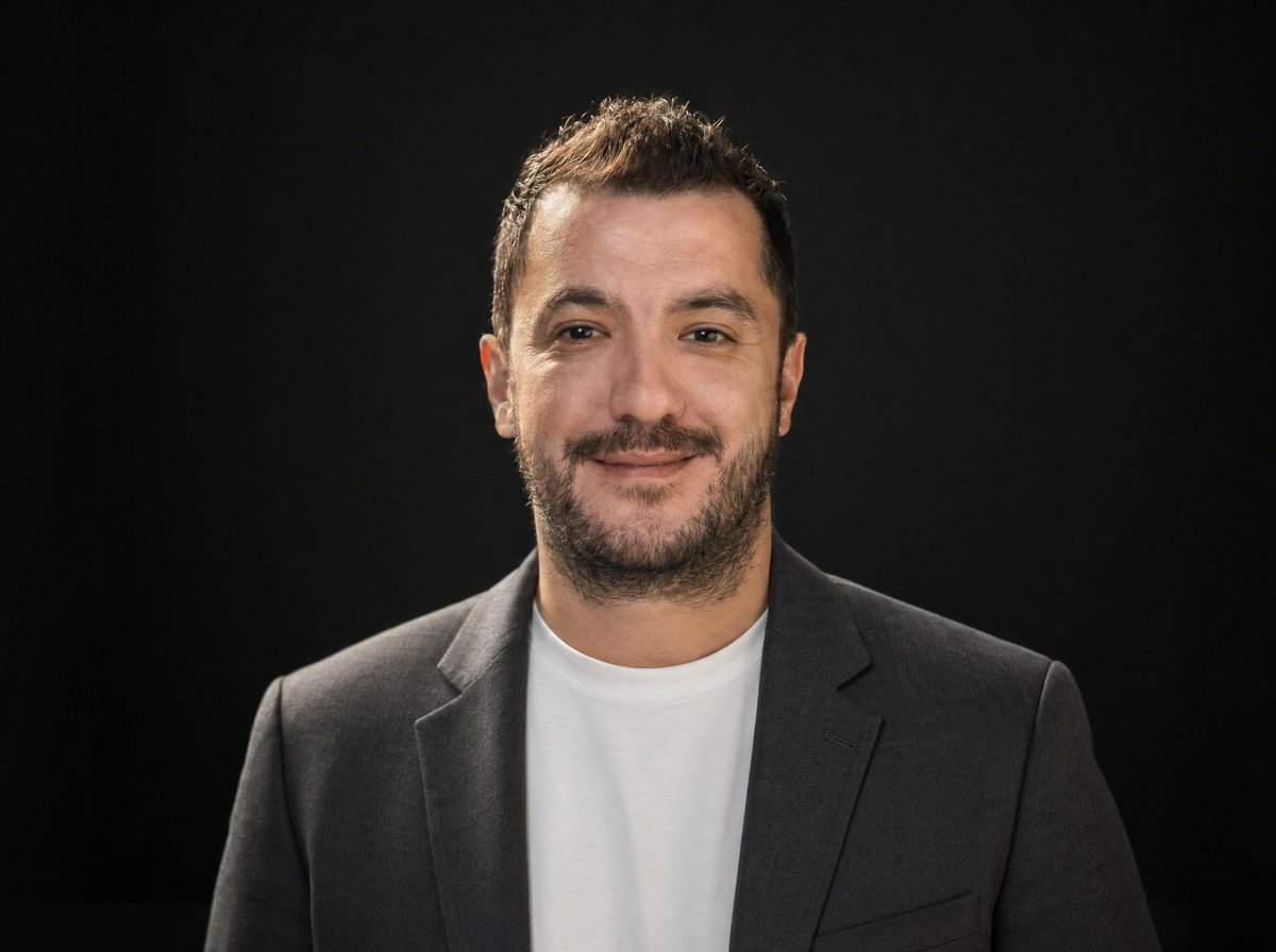 Professional Dark-Background LinkedIn Portrait Qwen Image prompt example: This prompt generates a clean studio-style professional profile headshot commonly used for LinkedIn,...