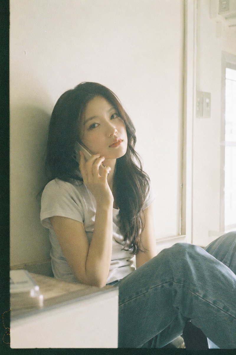 Japanese Film Aesthetic Portrait GPT Image 2 prompt example: A prompt for generating quiet, intimate portraits with a Japanese negative film aesthetic, featuring muted tones and...