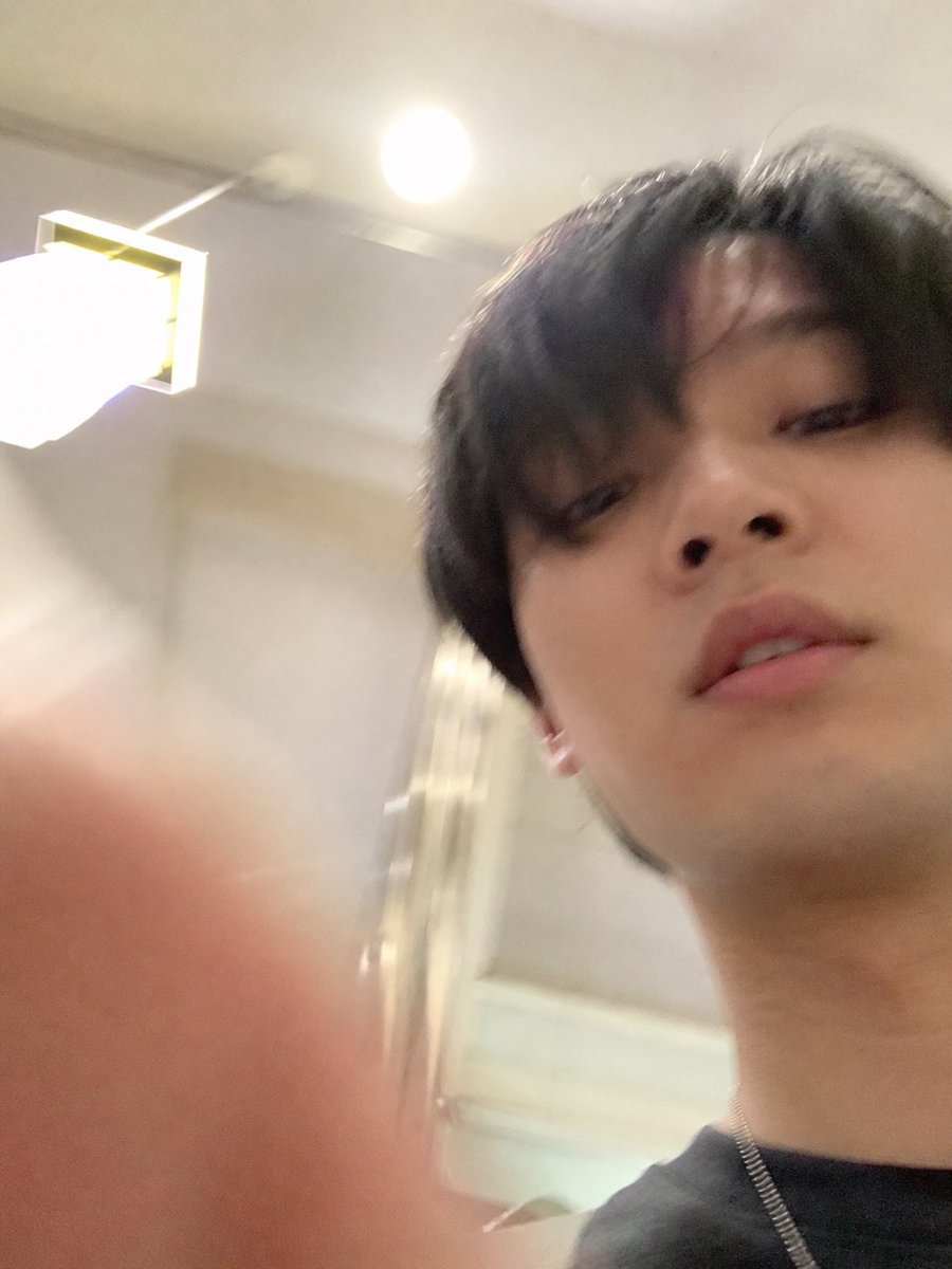 Accidental iPhone Selfie Extraction 的 Qwen Image 提示词示例图:Generates a standalone realistic failed selfie by extracting and extending the lower photo from a AI assistant screenshot...